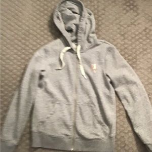 Perfect condition, Peloton branded hoodie and gold foiled star on the back